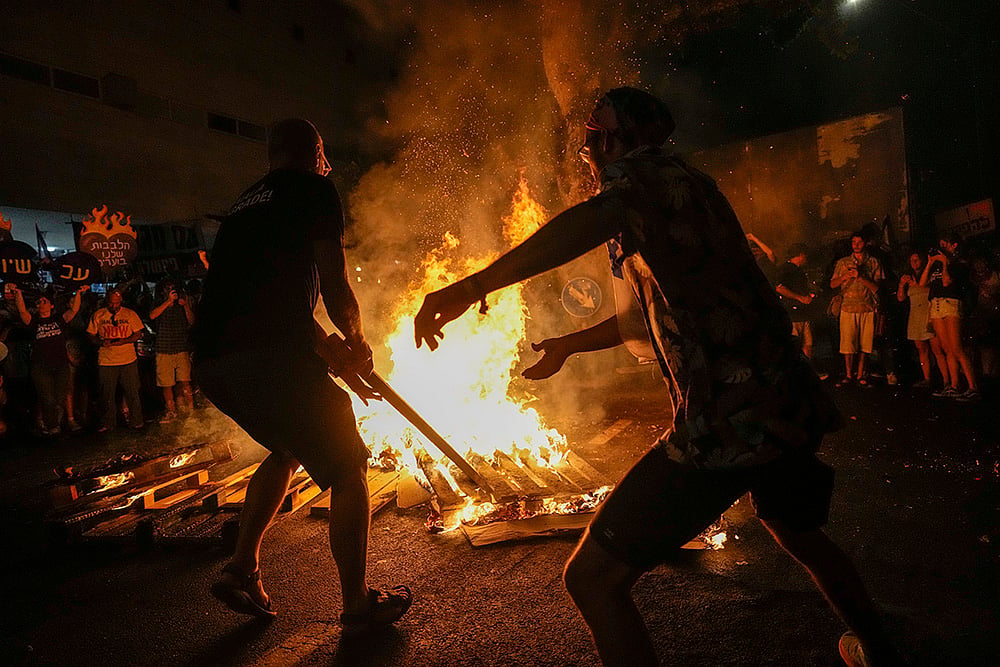 Demonstration in Tel Aviv - | Photo: AP/Ariel Schalit